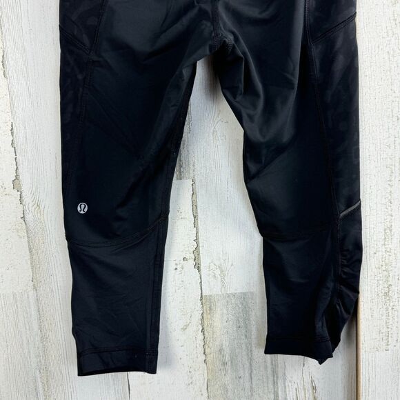 Lululemon Ladies Size 4 Black/Grey Cheetah Cropped Pockets Leggings - Picture 6 of 8
